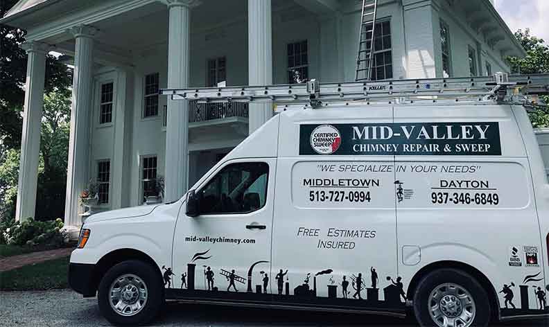 Mid-Valley Chimney Service Truck in Front of White House with Columns