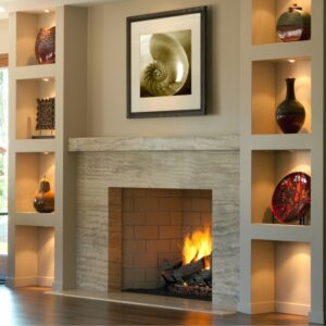 a fireplace surrounded by shelves and decor